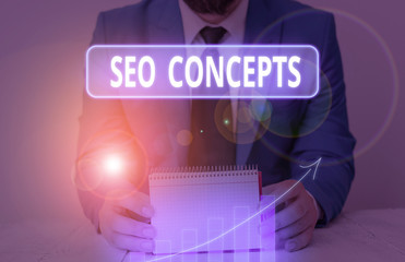 Writing note showing Seo Concepts. Business concept for a process of increasing the quality of...