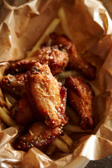 Fried chicken in brown paper 