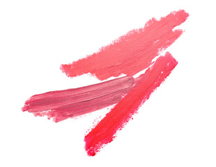 Strokes of bright lipsticks on white background