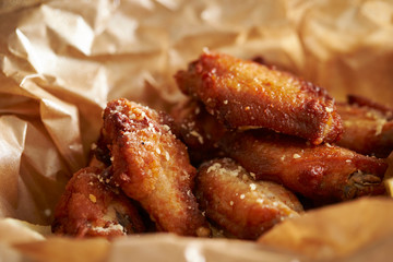 Fried chicken in brown paper 