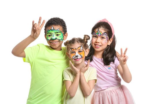 Funny children with face painting on white background