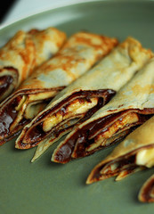 Pancake rolls with banana and chocolate