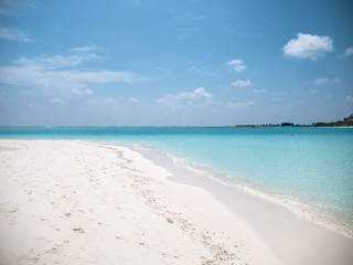 Fototapeta na wymiar Tropical Beach with White Sand. Maldives Panorama. Idyllic Beach on Meeru Island.