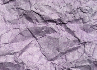 Abstract modern purple crumpled paper texture background.