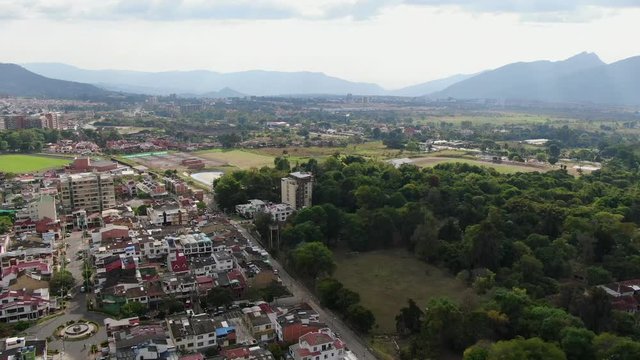 view of Fusagasuga (Fusa) town, forest and Andes mountains, pedestal aerial