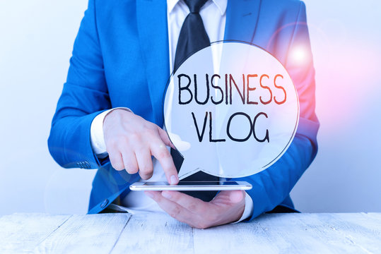 Handwriting text Business Vlog. Conceptual photo A video content about subject matter related to the company Businessman with pointing finger in front of him