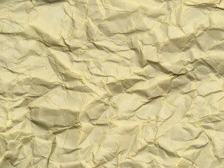 Yellow crumpled paper background with pattern for design