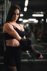 Fototapeta premium Fitness woman on training. Young woman in the gym. 
