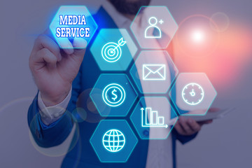 Conceptual hand writing showing Media Service. Concept meaning server programs that delivers...