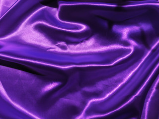Abstract purple fabric texture background with copy space for design