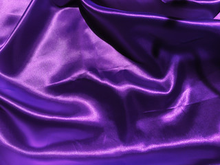 Abstract purple fabric texture background with copy space for design