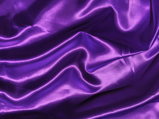 Abstract purple fabric texture background with copy space for design