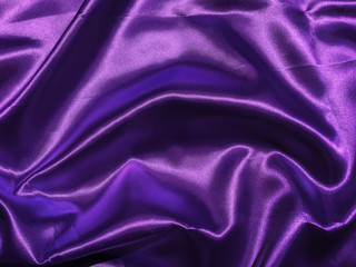 Abstract purple fabric texture background with copy space for design