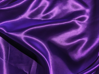 Pattern of purple fabric texture background.  wavy folds of grunge silk texture satin velvet material for design