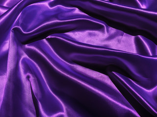 Pattern of purple fabric texture background.  wavy folds of grunge silk texture satin velvet material for design