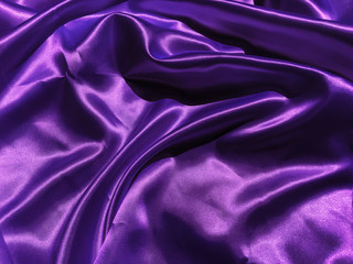Pattern of purple fabric texture background.  wavy folds of grunge silk texture satin velvet material for design