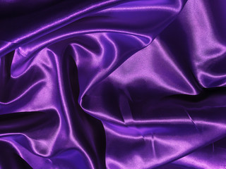 Pattern of purple fabric texture background.  wavy folds of grunge silk texture satin velvet material for design