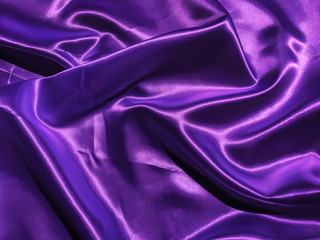 Beautiful smooth purple fabric texture background with copy space for design