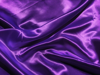 Beautiful smooth purple fabric texture background with copy space for design