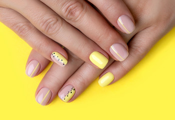 Woman's hands with spring summer nail design