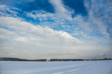 winter landscape with blue sky and clouds