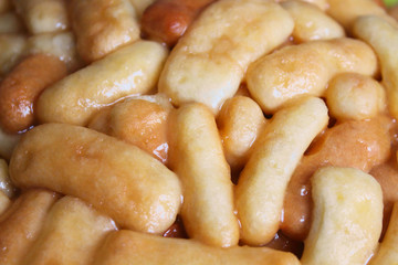 Chuck Chak - Tatar and Bashkir traditional dish. Cake made of sticks of dough and honey. Close-up. Background. Texture.
