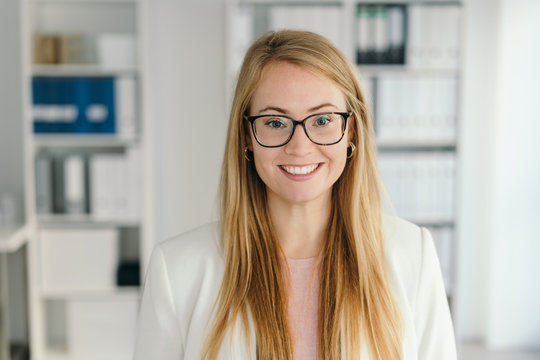 Smart young businesswoman wearing spectacles