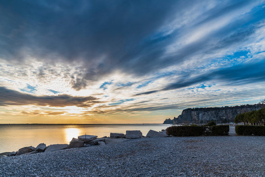 Winter sunset over the bay of Portopiccolo Sistiana. Duino. Italy