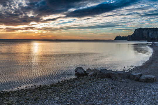 Winter sunset over the bay of Portopiccolo Sistiana. Duino. Italy
