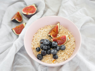 Healthy eating concept. Tasty healthy breakfast: cereal and fruit in a bowl. 