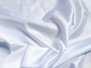 Obraz premium Solf white satin fabric texture background. use as wedding or aniversary day with copy space for design
