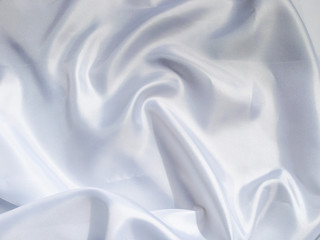 Obraz premium Solf white satin fabric texture background. use as wedding or aniversary day with copy space for design