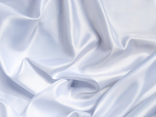 white crumpled fabric texture background. Silk curtain with fold waves for design