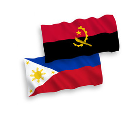 Flags of Philippines and Angola on a white background