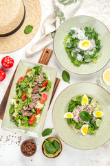 Salad of meat, tomato, cucumbers and fresh herbs