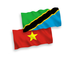 Flags of Tanzania and Vietnam on a white background