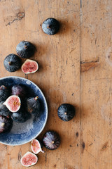 Top view of figs on a wooden table