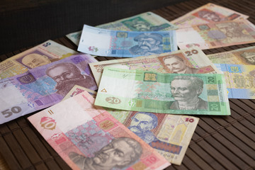 Paper money on a dark background. Ukrainian money, hryvnia.