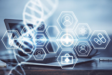 Desktop computer background and DNA drawing. Double exposure. Science concept.