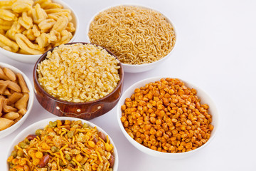 Bowls with fried snacks
