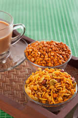 Bowls of snacks and tea
