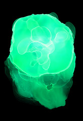 Abstract blue neon spots alcohol ink stains blots on a black background. Magical backgrounds