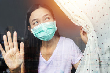 home quarantine concept. woman at risk of being infected with the Coronavirus stay isolation at...