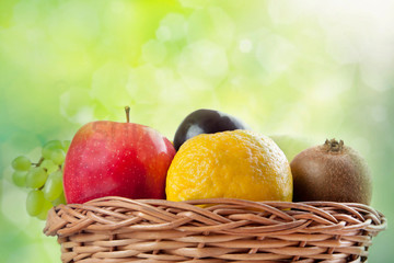 Wicker basket filled with fresh fruits