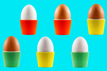 Colorful isolated Easter eggs in cups