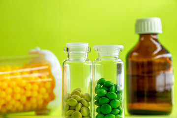 Potions and capsules, medicines, medical background.