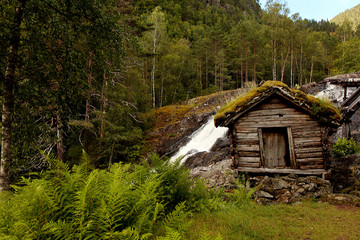 Very old watermills with grassy roofs in Norway