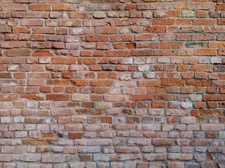 Texture of old red clay brick masonry.