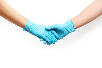 Handshake in blue medical gloves isolated on white background.