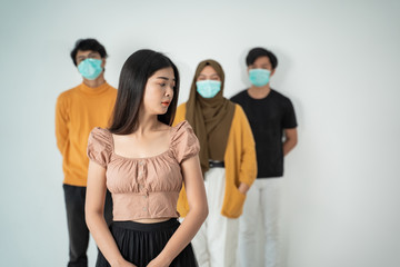 social distancing. people with masks keep their distance during virus symptoms